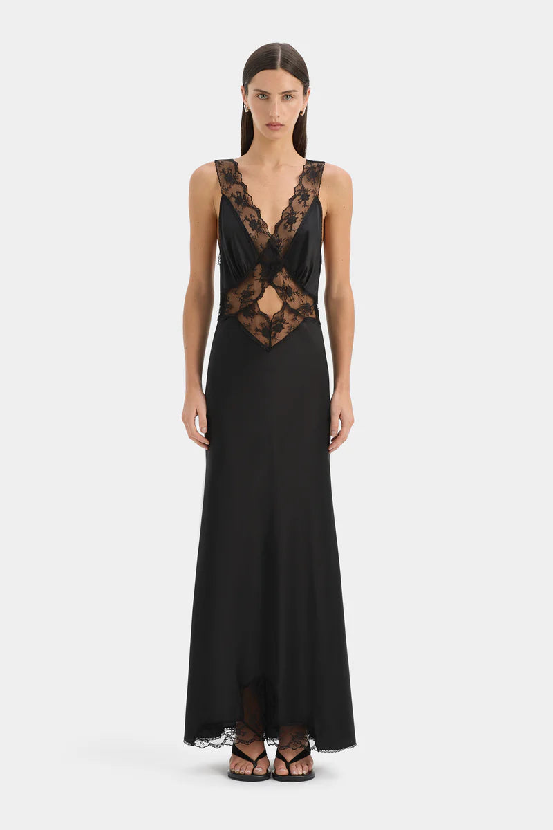 Black evening gown with lace detailing on a white background