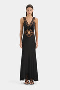 Black evening gown with lace detailing on a white background